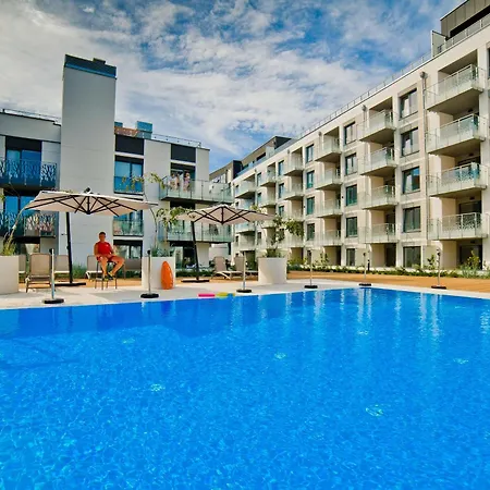 Апартаменты Porty B103 Nadmorskie Tarasy Pool Sauna Parking Колобжег